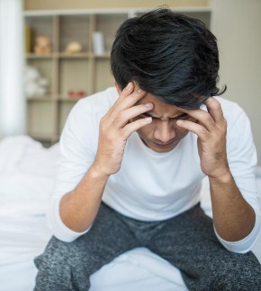 upset-man-on-the-bed-after-arguing-with-his-girlfriend-free-photo (1)